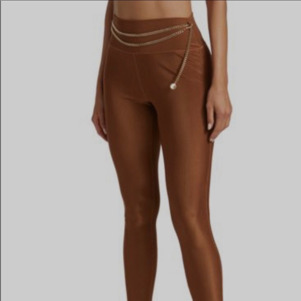 Brand new we wore what active ribbed copper leggings with chain.
